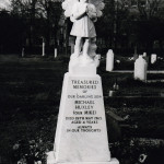 white marble gravestone black and white photo