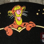 grave stone with carved tigger
