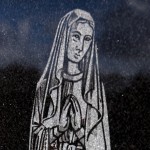 Our Lady feature on headstone
