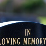 guilded lettering on gravestone