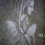 Our Lady engraved on headstone