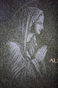 Our Lady engraved on headstone