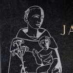 St Christopher ornamental etching on gravestone
