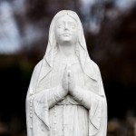 Our Lady white marble gravestone