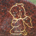 gold kneeling child angel headstone gold engraving